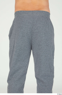 Simeon buttock dressed grey joggers sports thigh 0003.jpg